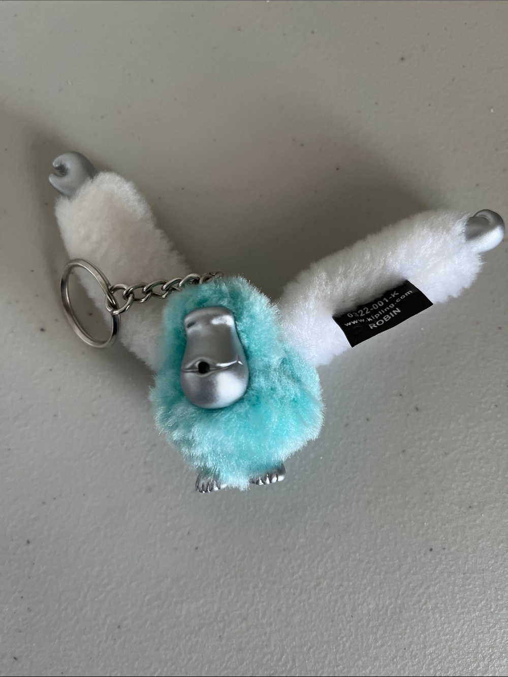 Kipling Robin Plush Keychain in White and Aqua